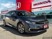 This 2019 Honda Civic Sedan EX boasts a stunning Cosmic Blue Metallic exterior and a sleek black fab... (image 7)