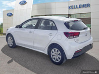This 2022 Kia Rio 5-door LX+ hatchback offers practical everyday driving with surprising comfort. Wi... (image 2)