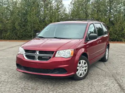LOW MILEAGE 2014 DODGE GRAND CARAVAN. It has keyless entry, power front windows, power mirrors, powe...