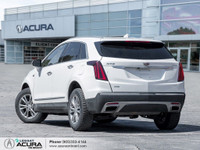 Finished in a Crystal White Tricoat exterior that complements the Black leather interior, standing o... (image 6)