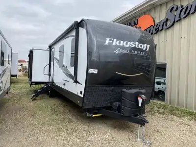 This trailer has an enormous rear kitchen area with a double slide out on each side of the unit. The...