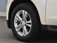The 2014 Chevrolet Equinox LT AWD in a crisp white finish is a versatile and capable SUV designed to... (image 8)