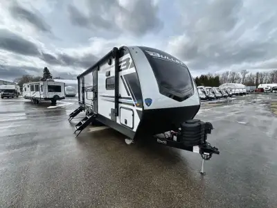 Keystone Bullet travel trailer 265FKS highlights: King Bed Slide Out Fireplace Do-More Dinette Table...