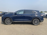 Under the glistening Rhapsody Blue exterior, the 2019 Lincoln Nautilus Reserve stands as a testament... (image 3)