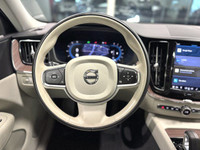 The 2022 Volvo XC60 Momentum blends luxury and performance seamlessly, offering a refined driving ex... (image 7)