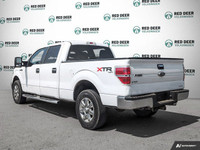 The 2014 Ford F-150 in pristine white is a robust 4x4 truck designed for those who demand power and... (image 4)