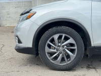 The 2016 Nissan Rogue AWD 4dr S is a practical compact crossover SUV that offers reliability and ver... (image 9)