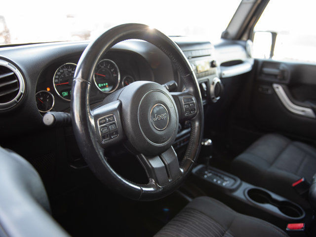 2012 Jeep Wrangler Unlimited Sahara in Cars & Trucks in Calgary - Image 3