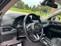 WAS: $28998 NOW: $27248 plus taxes and licensing feesRefined Comfort & Capability: 2022 Mazda CX-5 G... (image 3)