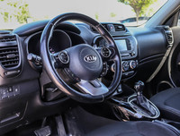 The 2018 Kia Soul EX in blue with front-wheel drive offers a responsive handling experience thanks t... (image 6)