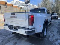 The 2024 GMC Sierra 3500HD Denali in White Frost is a commanding and luxurious heavy-duty pickup tru... (image 2)