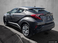 Make a bold statement on Ottawa's streets with this eye-catching 2022 Toyota C-HR, a compact crossov... (image 1)