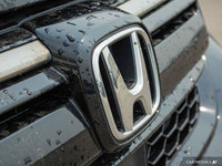 This Honda CR-V delivers a Intercooled Turbo Regular Unleaded I-4 1.5 L/91 engine powering this Vari... (image 8)