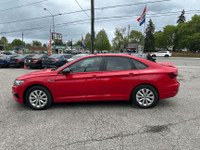 C ome by and check out this eye-catching 2019 Volkswagen Jetta Highline with a bold red exterior and... (image 1)