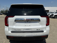 Roll out in style with this elegant and robust 2023 GMC Yukon SLT, showcasing a luxurious White Fros... (image 6)