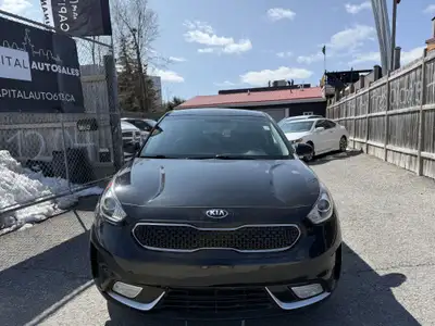 Check out this stylish 2019 Kia Niro EX Premium SUV! With a sleek black exterior and interior, this...