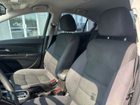 The 2015 Chevrolet Cruze 1LT offers a balanced driving experience that prioritizes comfort and effic... (image 4)