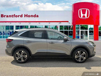 Experience the efficiency and versatility of this 2024 Ford Escape PHEV, boasting a powerful 2.5L At... (image 6)