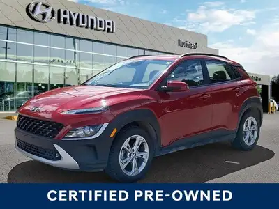 This 2022 Hyundai Kona Preferred SUV boasts a vibrant Pulse Red exterior and a sleek black interior....