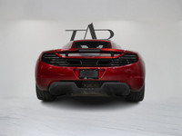 This stunning 2014 McLaren MP4-12C Spider delivers an exhilarating open-top driving experience with... (image 6)