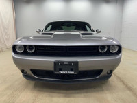 Step into the driver's seat of this sleek 2018 Dodge Challenger SXT Plus, a head-turning coupe that'... (image 1)