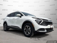 Experience the practicality and reliability of a 2023 Kia Sportage LX, boasting a sleek white exteri... (image 8)