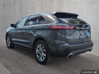 This 2024 Ford Edge Titanium AWD, presented in a sophisticated *Gray* finish, offers a compelling bl... (image 2)