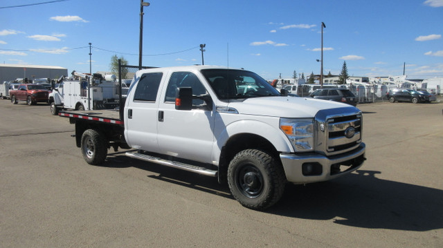 2013 Ford F-350 XLT CREW CAB 4X4 FLAT DECK in Cars & Trucks in Edmonton - Image 2