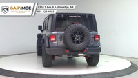 The 2025 Jeep Wrangler 4xe 4-Door Willys, in a striking gray, is a new adventure-ready 4x4 SUV that... (image 3)