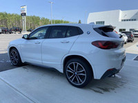 Unveil the allure of the 2022 BMW X2 xDrive28i, a summit of automotive craftsmanship adorned in a st... (image 5)