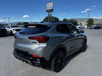 Expressive and energetic, our 2026 Buick Encore GX Sport Touring AWD in Moonstone Gray Metallic stan... (image 7)