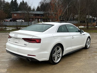 Elevate your driving experience with the 2018 Audi A5 Technik S-Line, a stunning combination of soph... (image 6)