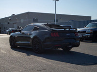 The 2022 Ford Mustang GT is a modern muscle car that combines thrilling performance with refined tec... (image 5)