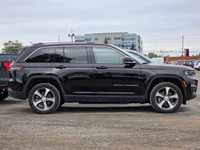 This 2022 Jeep Grand Cherokee 4xe, presented in a menacing and sophisticated *Black* finish, represe... (image 5)
