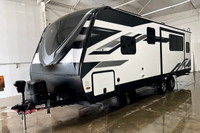 The 2023 Grand Design Imagine 2500RL is a rear-living travel trailer that blends residential comfort... (image 5)
