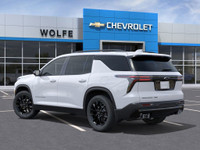 Under the prairie skies lies a stalwart companion, the 2025 Chevrolet Traverse LT AWD, dressed in a... (image 5)