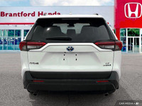 Enjoy effortless adventures in this 2021 Toyota RAV4 Hybrid LE. Its impressive fuel efficiency and a... (image 4)
