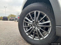 Experience the smooth handling and confident all-wheel drive of this 2021 Mazda CX-5 CX5TRXA. With o... (image 9)