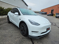 This stunning TESLA MODEL Y WITH UPGRADED LUXURIOUS Pearl White Exterior paint option with the stunn... (image 8)