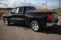 This Ram 1500 has a dependable Gas/Electric V-6 3.6 L/220 engine powering this Automatic transmissio... (image 1)