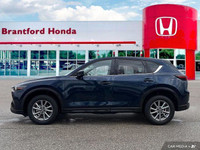 Experience the smooth ride and confident handling of this 2024 Mazda CX-5 GS. This well-maintained S... (image 1)