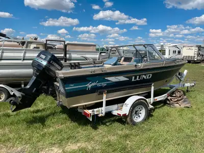 1994 Lund 1750 Fishing Boat. This boat comes equipped with Evinrude 115HP, Evinrude 15HP, Hummingbir...