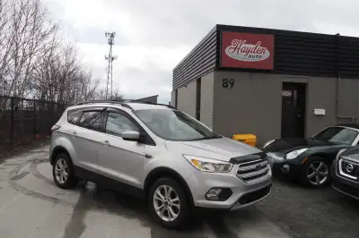 2018 Ford Escape SE AWD Low Mileage all Wheel Drive SUV 2 sets of Rims and Tires. Trades Financing a...