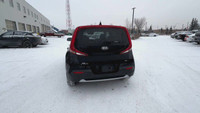 This Kia Soul is equipped with: Cloth Seating Surfaces, Heated front seats, Heated Steering Wheel, R... (image 7)