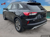 This Ford Escape boasts a Intercooled Turbo Premium Unleaded I-3 1.5 L/91 engine powering this Autom... (image 4)