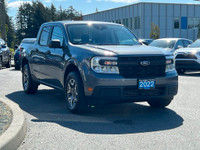 This 2022 Ford Maverick XL has an Carbonized Grey Exterior and Black Onyx Med Interior with seating... (image 9)