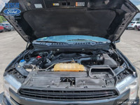 This trade includes: - Heated Front and Rear Seats - Heated Steering Wheel - Remote Start - Reverse... (image 9)