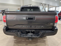 Underneath the robust exterior of this pre-owned 2021 Toyota Tacoma 4WD DOUBLE ALL-TERRAIN pickup-tr... (image 6)
