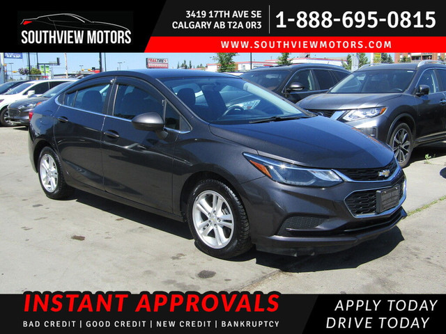 2017 Chevrolet Cruze LT w-1SD Sdn 1.4L B.CAMERA/HEATED SEATS in Cars & Trucks in Calgary