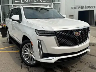 The 2022 Cadillac Escalade stands tall with commanding style and capability, finished in Crystal Whi...